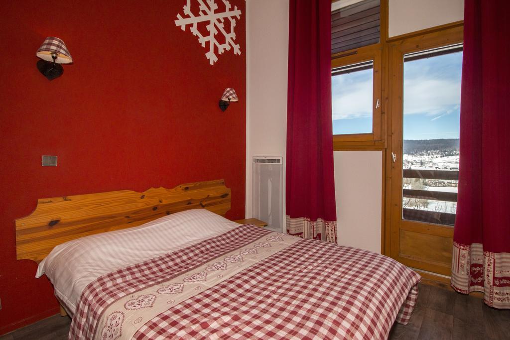 Hotel Le Grand Chalet Foncine-le-Haut Quarto foto
